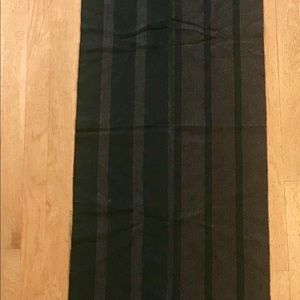 71 inches of 100% cashmere.  A classic staple.